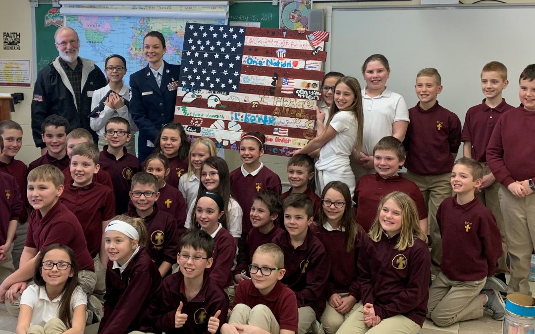 Guest speakers visit fourth-graders during lesson on symbolism